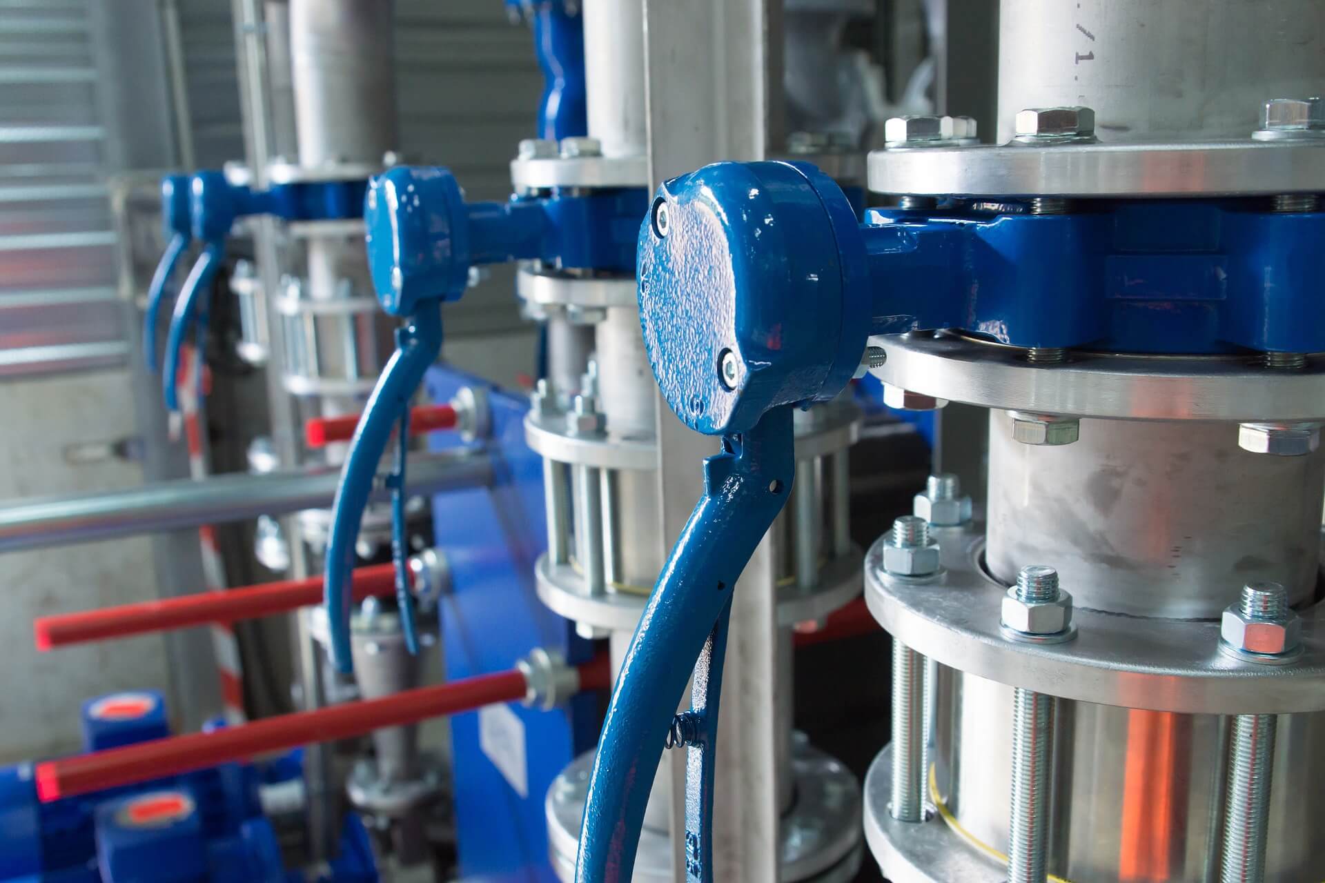 Industrial tube valve in a factory