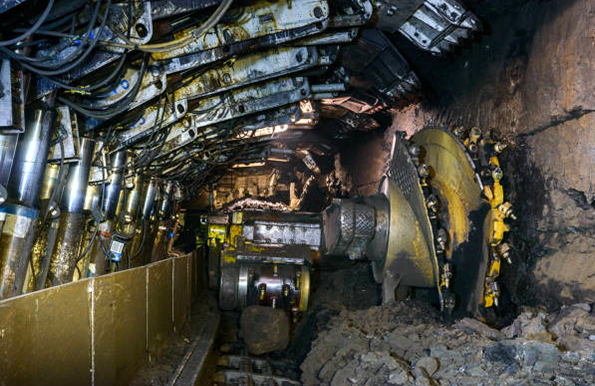 Underground drilling rotating cutting drums and movable hydraulic powered