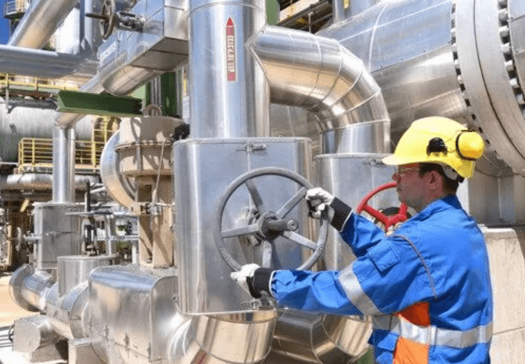 a person in a valve factory